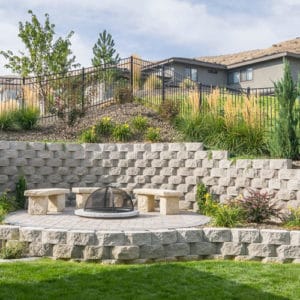 retaining wall, paver patio, benches and fire pit