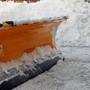 close-up of yellow snow plow